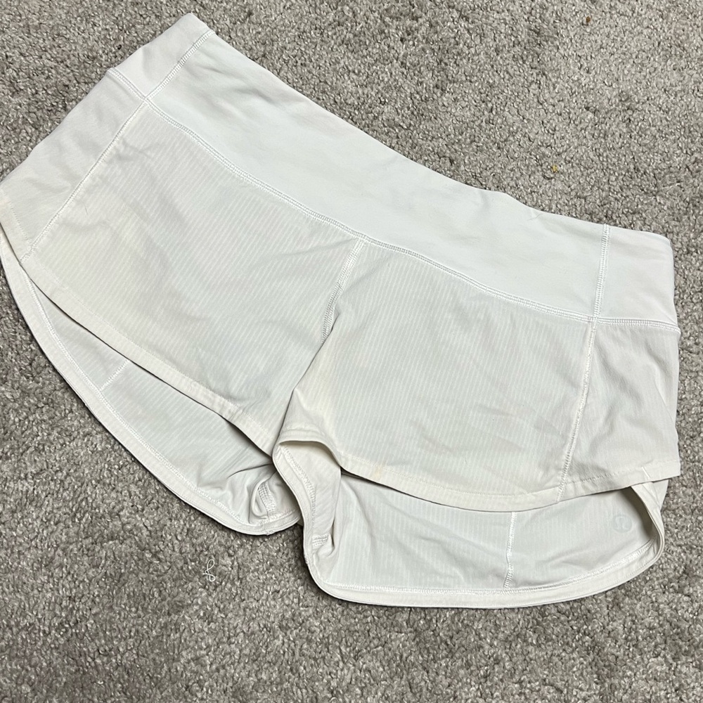 White LULULEMON athletic shorts
